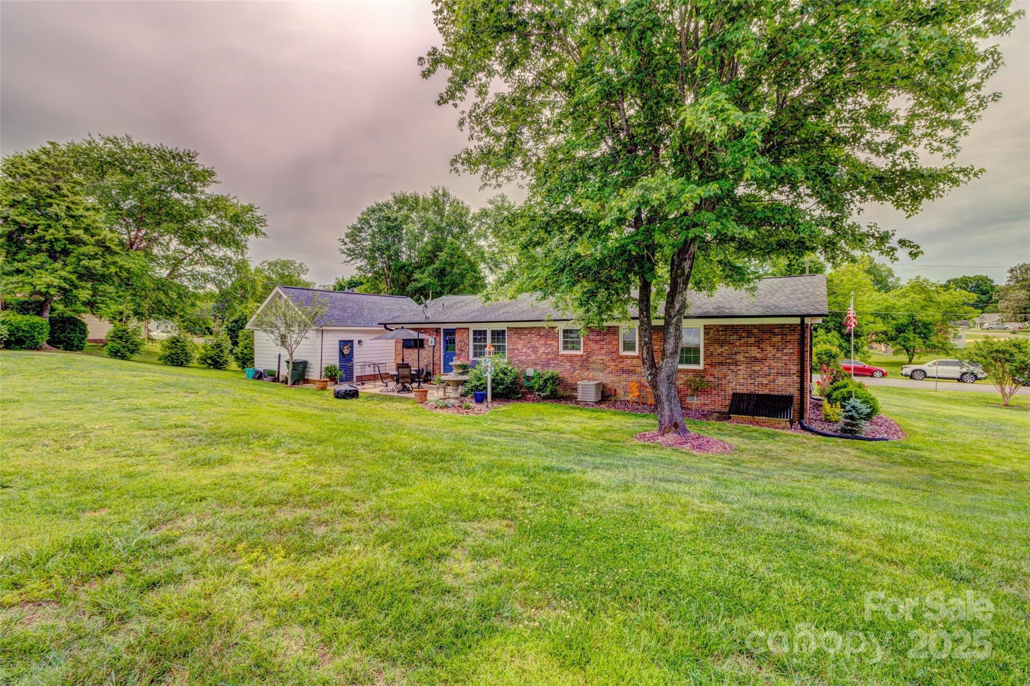 800 Sunset Road Cherryville, NC 28021 - Photo 18 of 20 a view of a house with backyard and sitting area