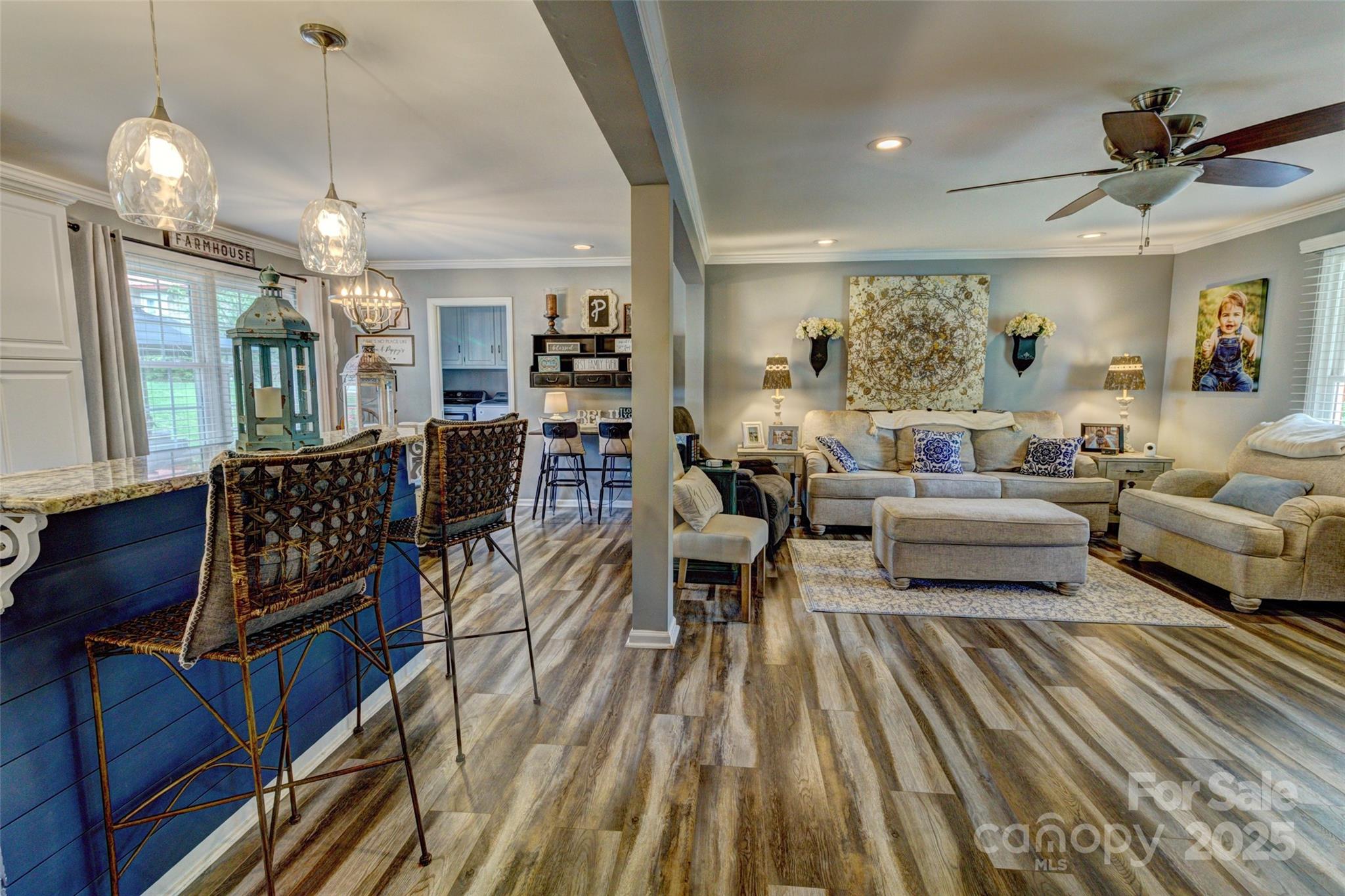 800 Sunset Road Cherryville, NC 28021 - Photo 20 of 20 a living room with furniture a chandelier and a dining table