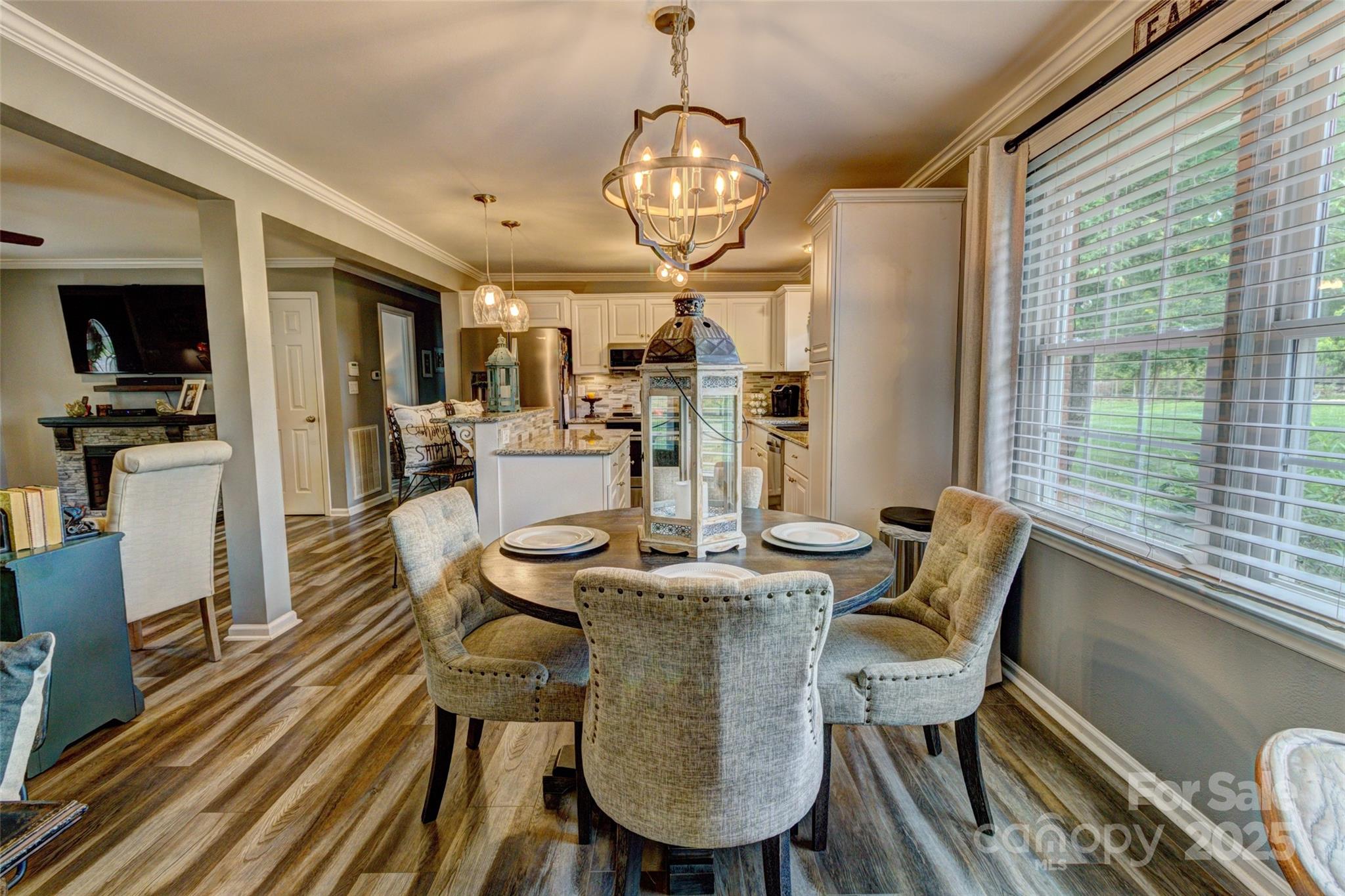 800 Sunset Road Cherryville, NC 28021 - Photo 5 of 20 a view of a dining room with furniture window and wooden floor