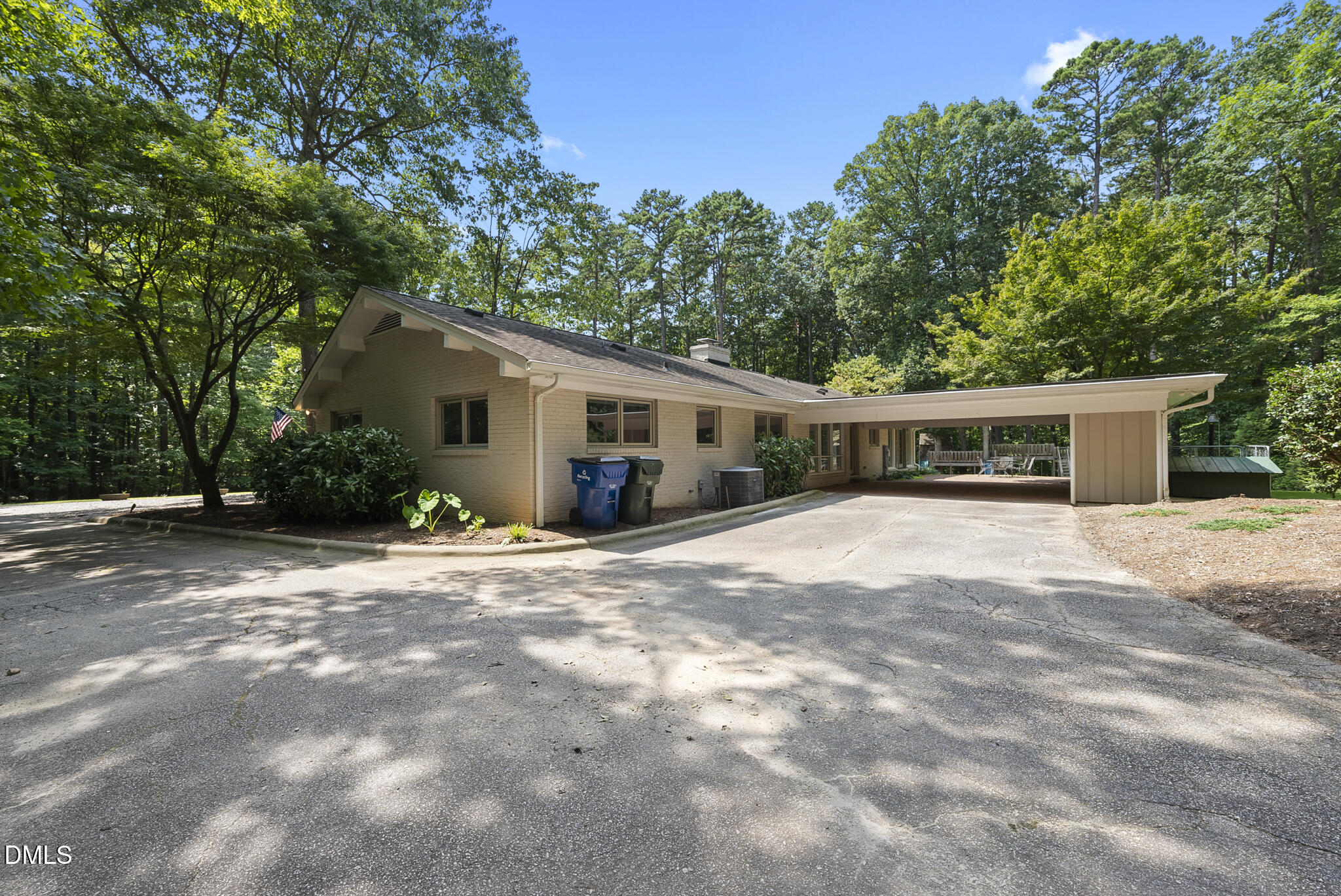 1605 Ridge Road Raleigh, NC 27607 - Photo 10 of 34 a front view of a house with a yard and a garage