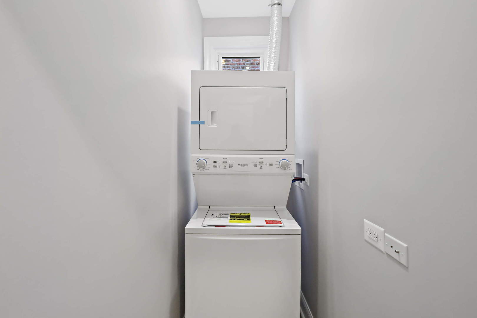 2626 North Ridgeway Avenue, Unit 1 Chicago, IL 60647 - Photo 11 of 16 a utility room with dryer and washer