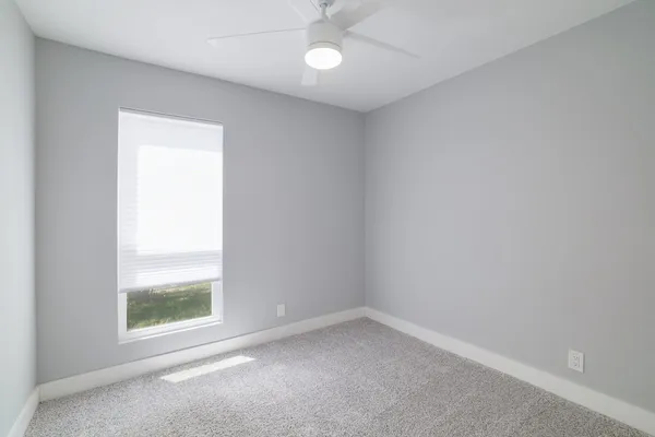 an empty room with a window