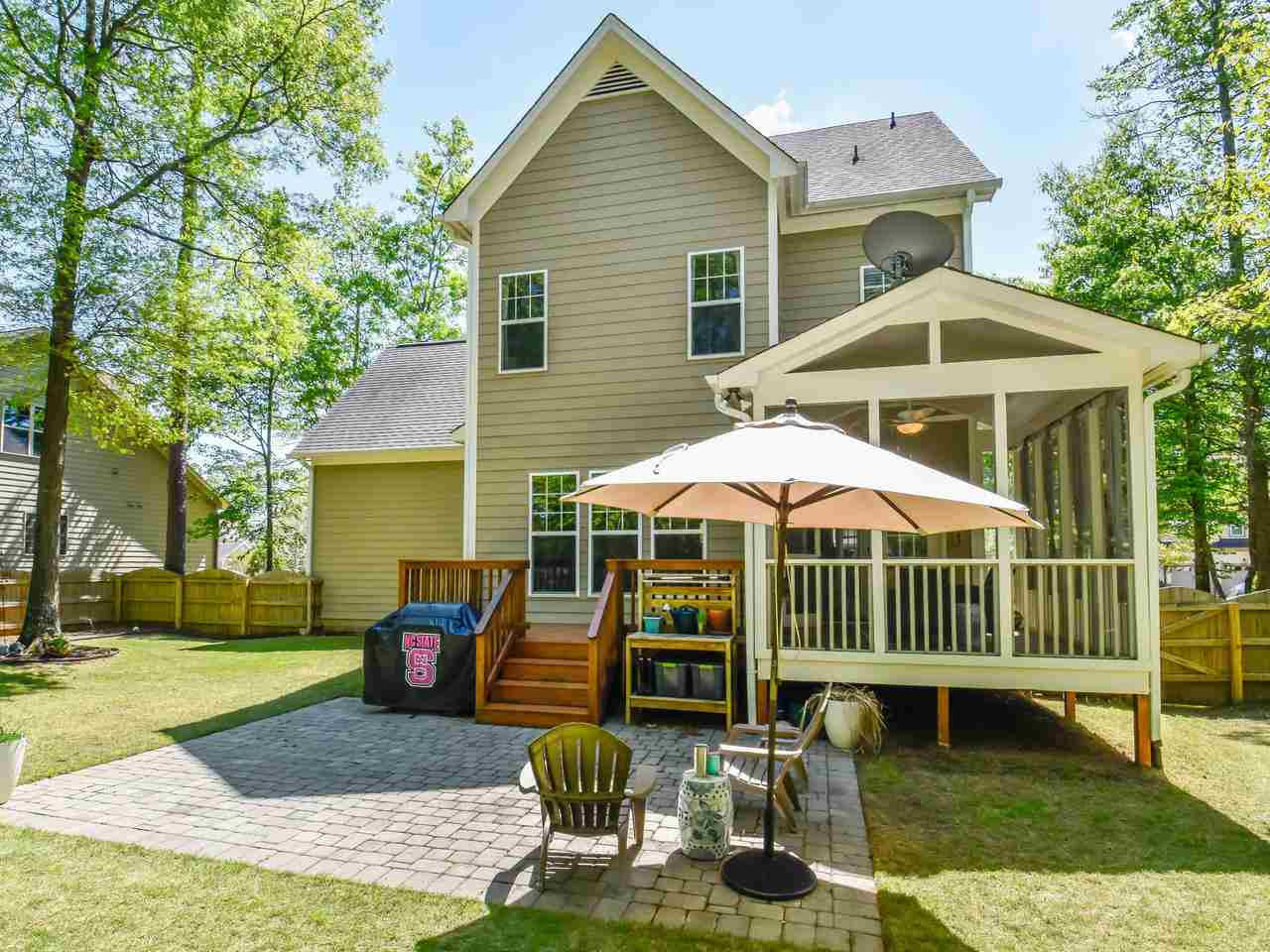 4417 Brighton Ridge Drive Apex, NC 27539 - Photo 25 of 30 VIEW OF THE EXTERIOR BACK OF THE HOME with so many living and Entertaining areas Exterior Back