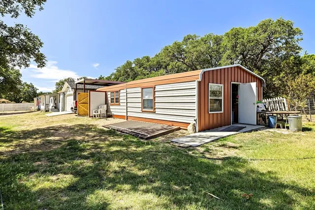 a house view with a outdoor space
