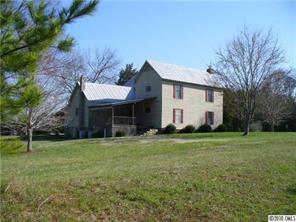 6049 Cress Road Concord, NC 28025 - Photo 1 of 8 a view of a house with a yard