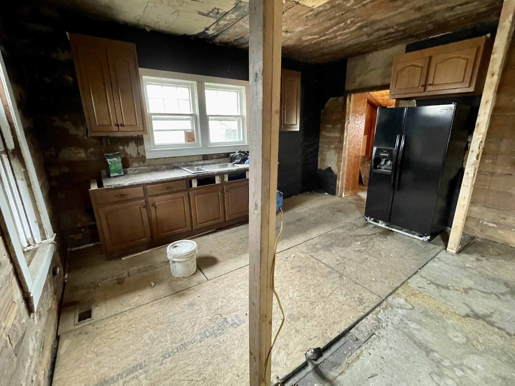 136 Scott Orchard Road Taft, TN 38488 - Photo 16 of 29 a kitchen with a refrigerator and a sink