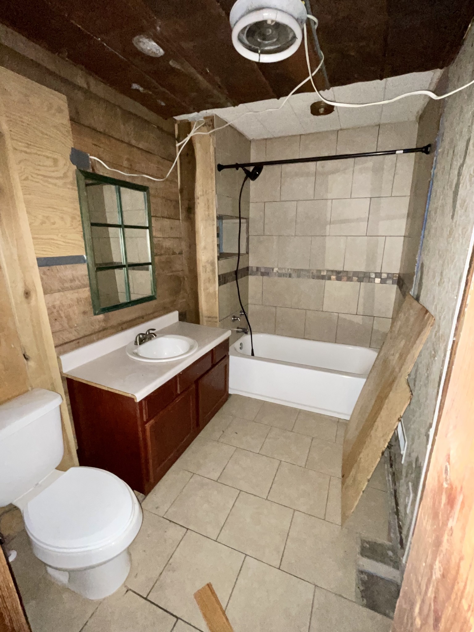 136 Scott Orchard Road Taft, TN 38488 - Photo 21 of 29 a bathroom with a sink a toilet and shower