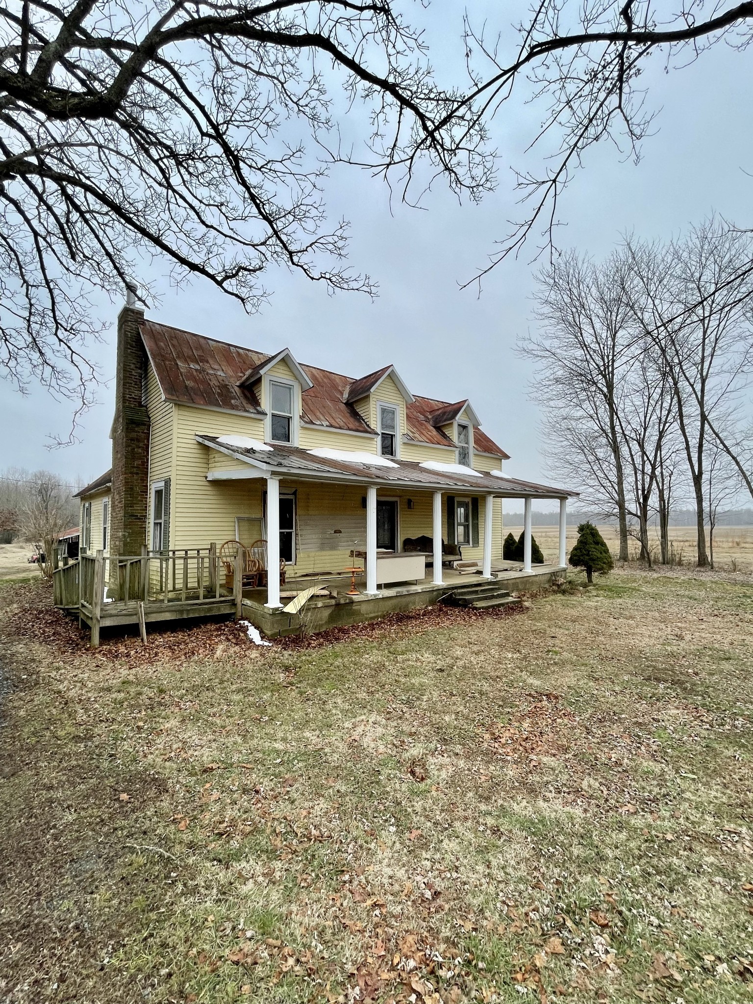 136 Scott Orchard Road Taft, TN 38488 - Photo 9 of 29 a front view of a house with a yard