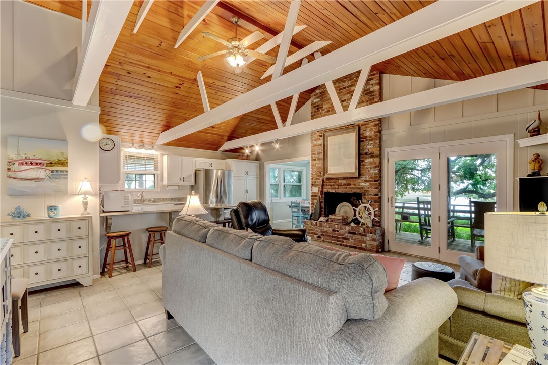 97020 Pirates Point Road Yulee, FL 32097 - Photo 3 of 35 a living room with furniture and a large window