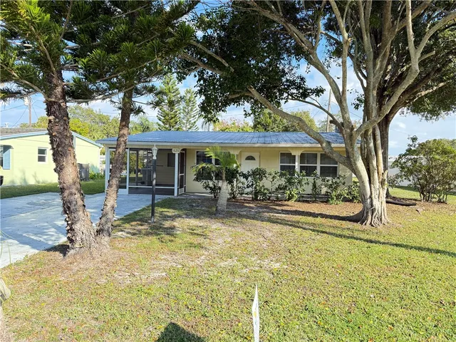 a view of a house with swimming pool