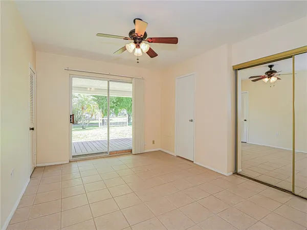 a view of hallway with windows