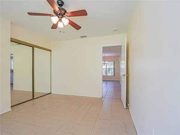 a utility room with cabinets washer and dryer