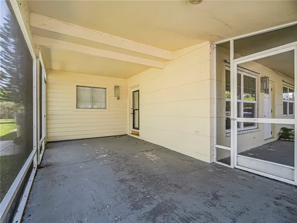 a view of a backyard with tree s