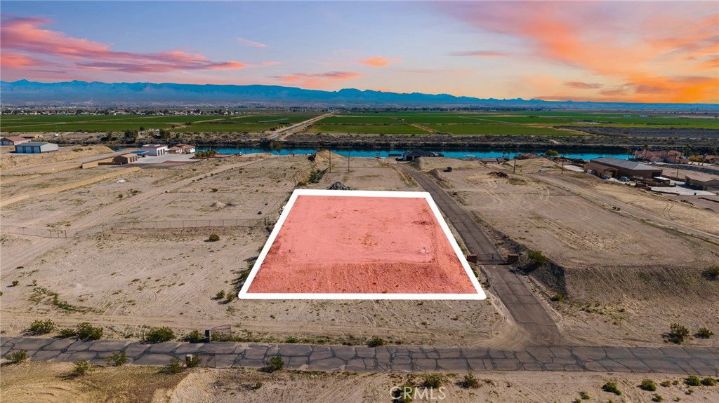 a view of swimming pool with outdoor seating and city view