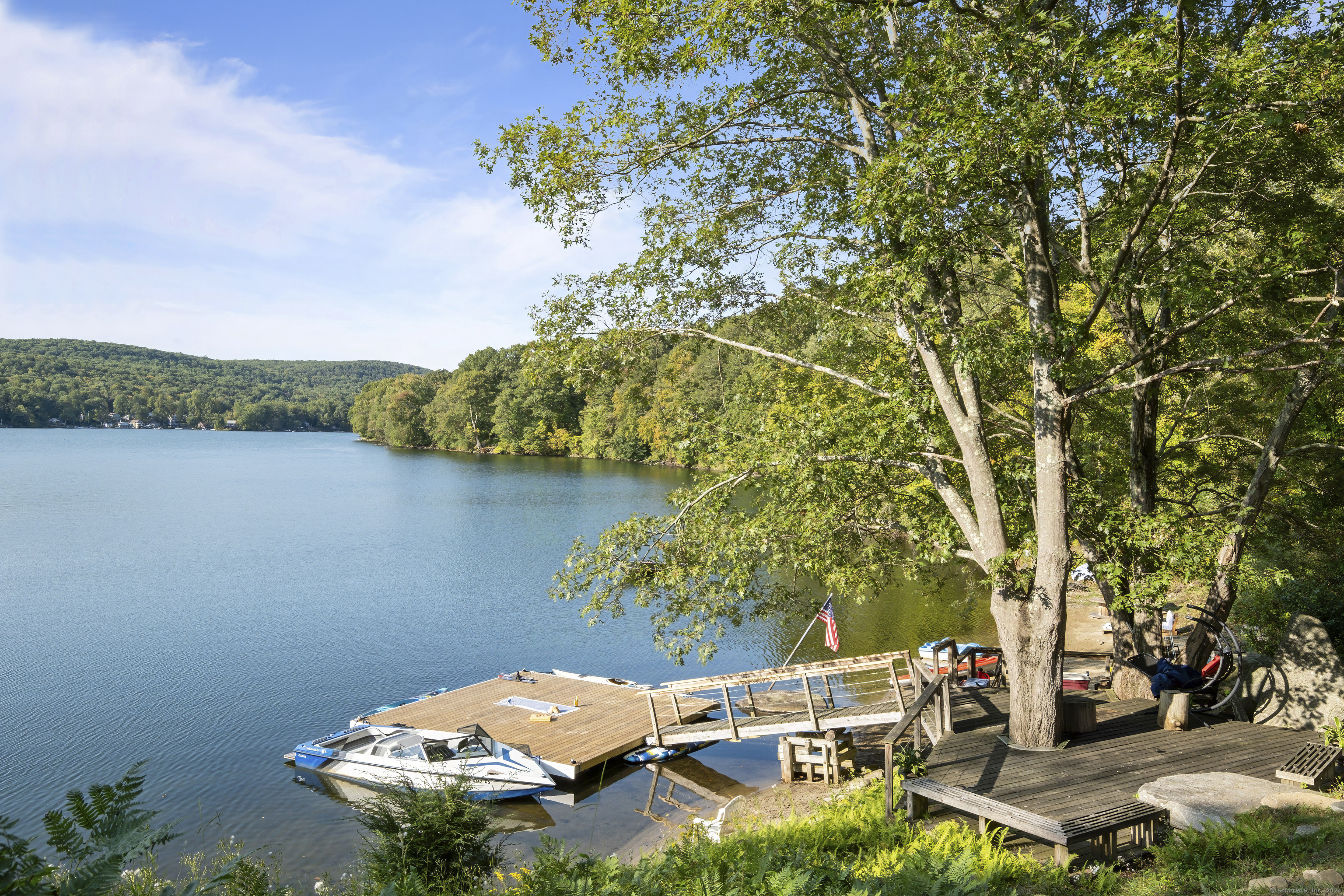 1018 Highway 292 Pawling, NY 12531 - Photo 1 of 34 a view of a lake with lawn chairs