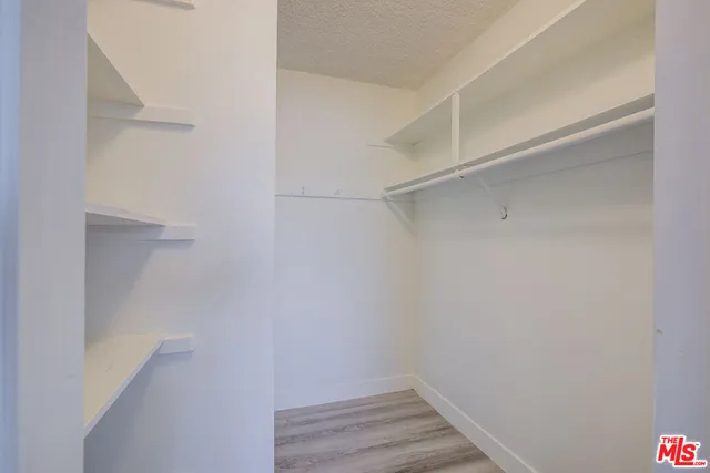 a view of small space with racks on the wall