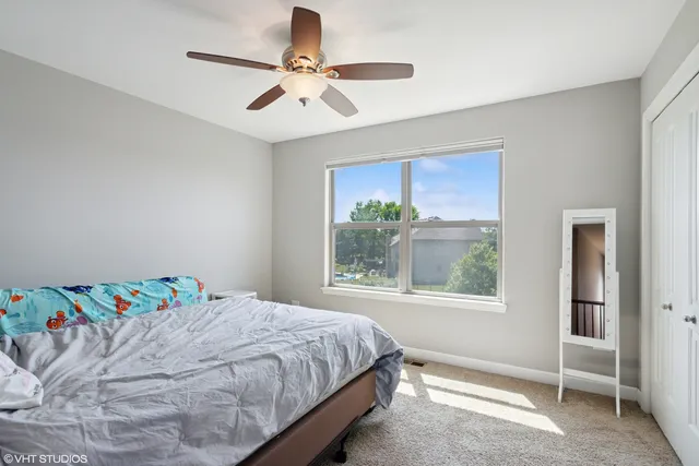 a bathroom with a sink vanity and a mirror