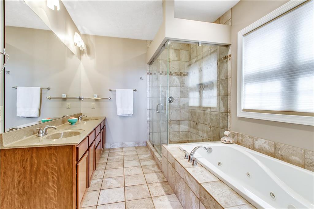 238 Prospect Street Pittsburgh, PA 15211 - Photo 17 of 21 Master Bathroom with dual sinks, stand up shower and Jacuzzi tub.