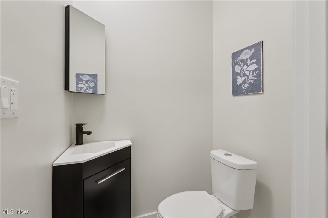 548 Spring Street Wooster, OH 44691 - Photo 12 of 45 Bathroom with toilet and vanity