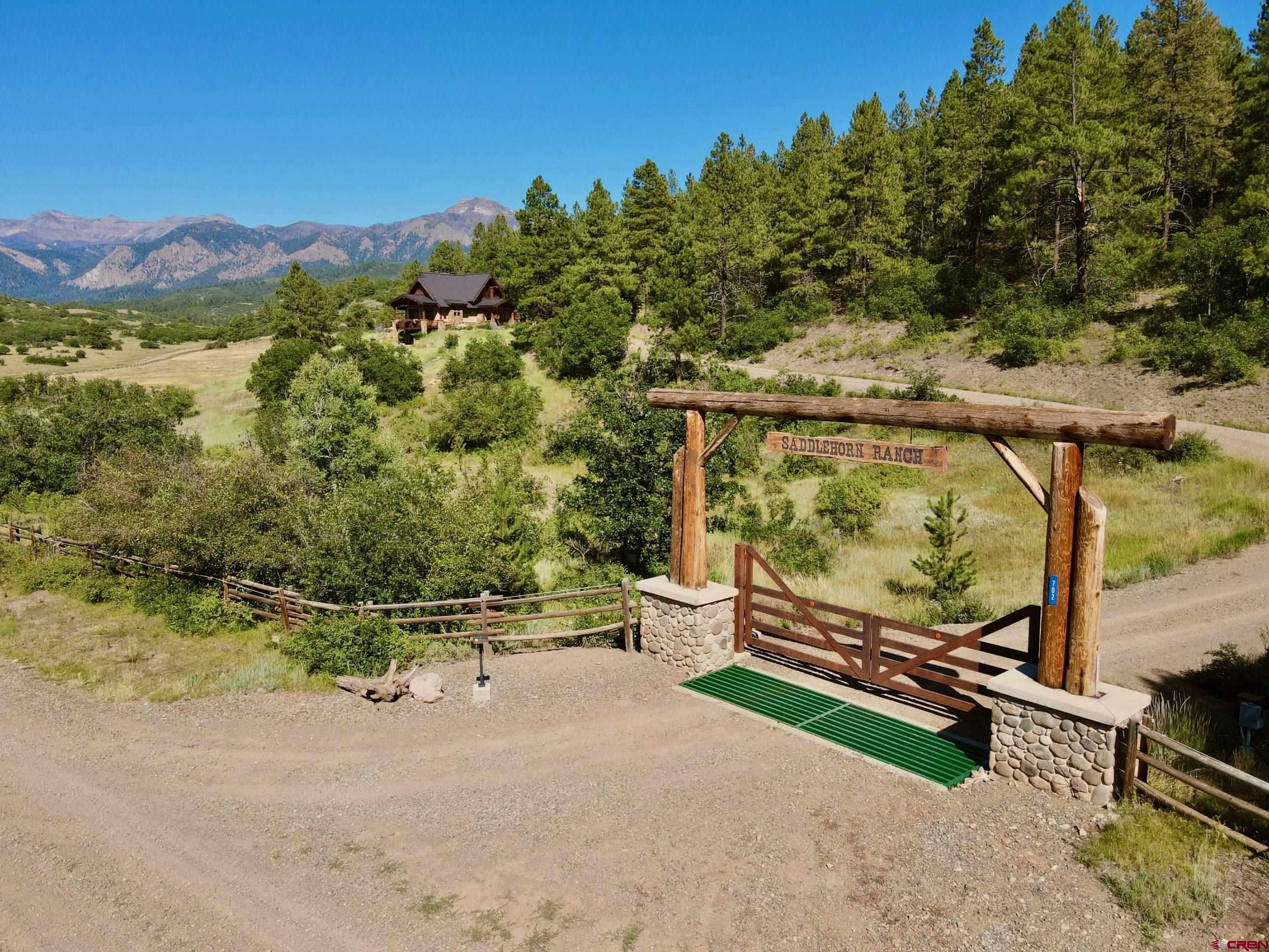 702 Jenni Lane, Unit SADDLEHORN RANCH Chromo, CO 81128 - Photo 2 of 45 a view of outdoor space and yard