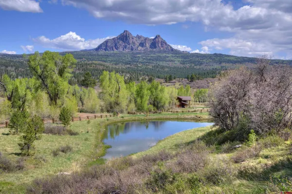 a view of a lake with a mountain in the background