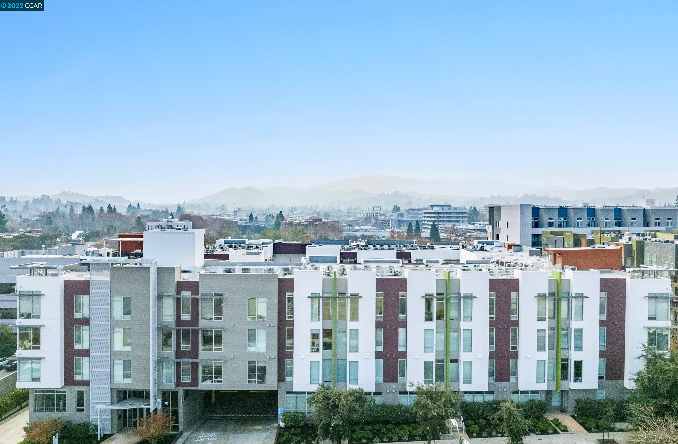 555 Ygnacio Valley Road, Unit 422 Walnut Creek, CA 94596 - Photo 1 of 1 a large building with a city view