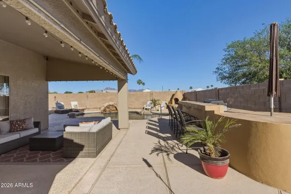 a view of a terrace with furniture