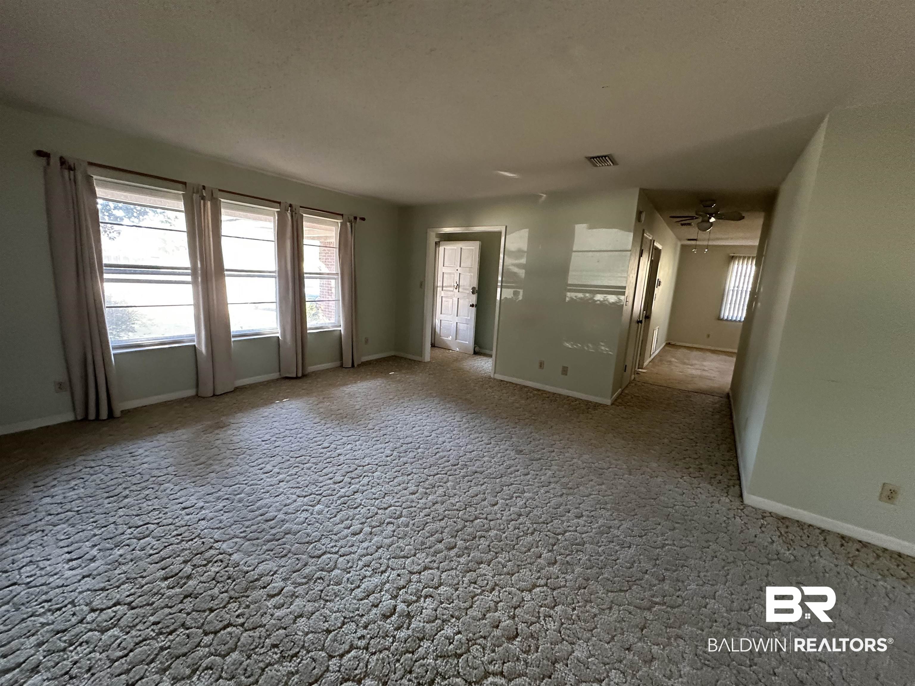 1 Yupon Circle Foley, AL 36535 - Photo 13 of 30 Empty room featuring ceiling fan and carpet
