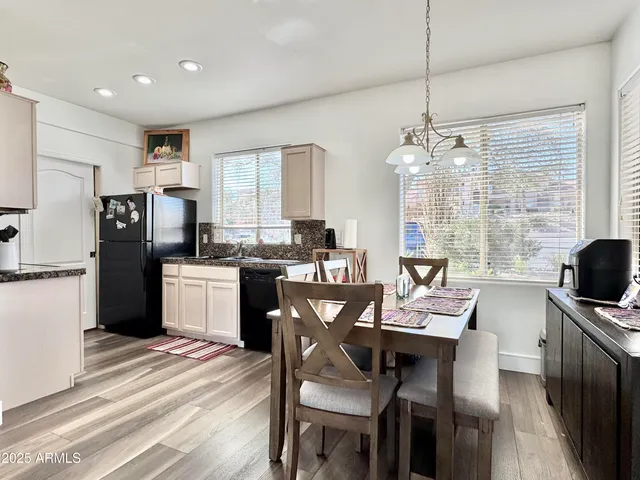 a kitchen with a sink and a stove