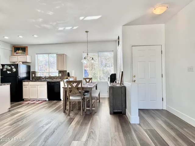 a view of a yard with an ocean view