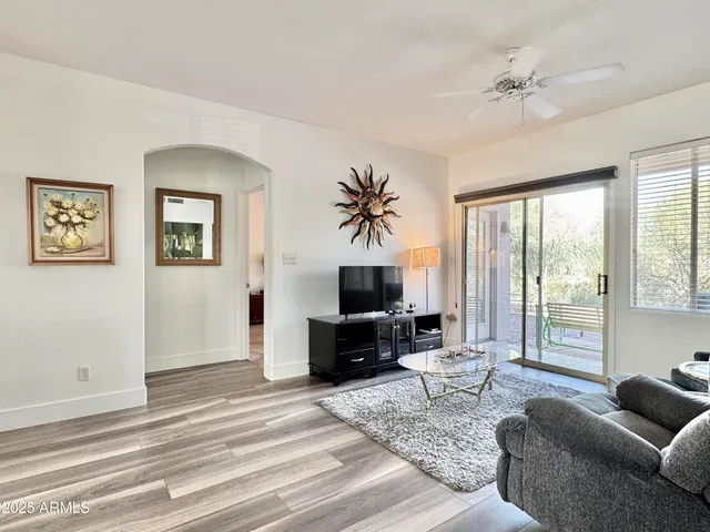a utility room with cabinets dryer and washer