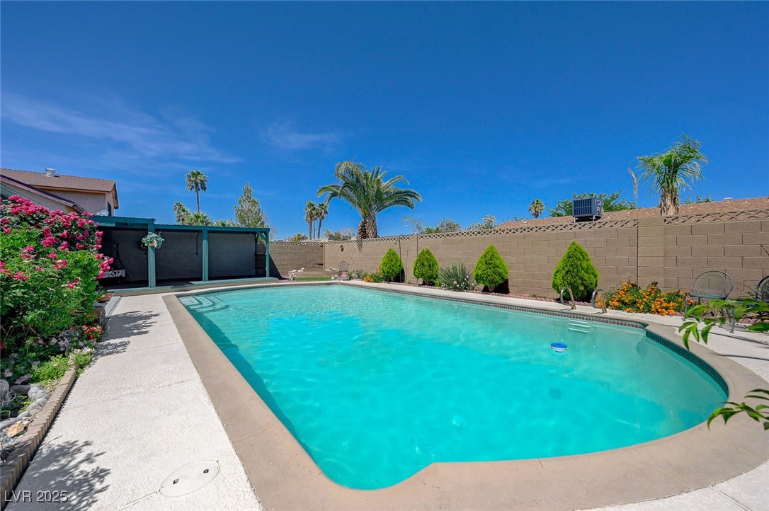 3266 Mountain Spring Road Las Vegas, NV 89146 - Photo 45 of 49 View of swimming pool featuring a fenced backyard and a fenced in pool