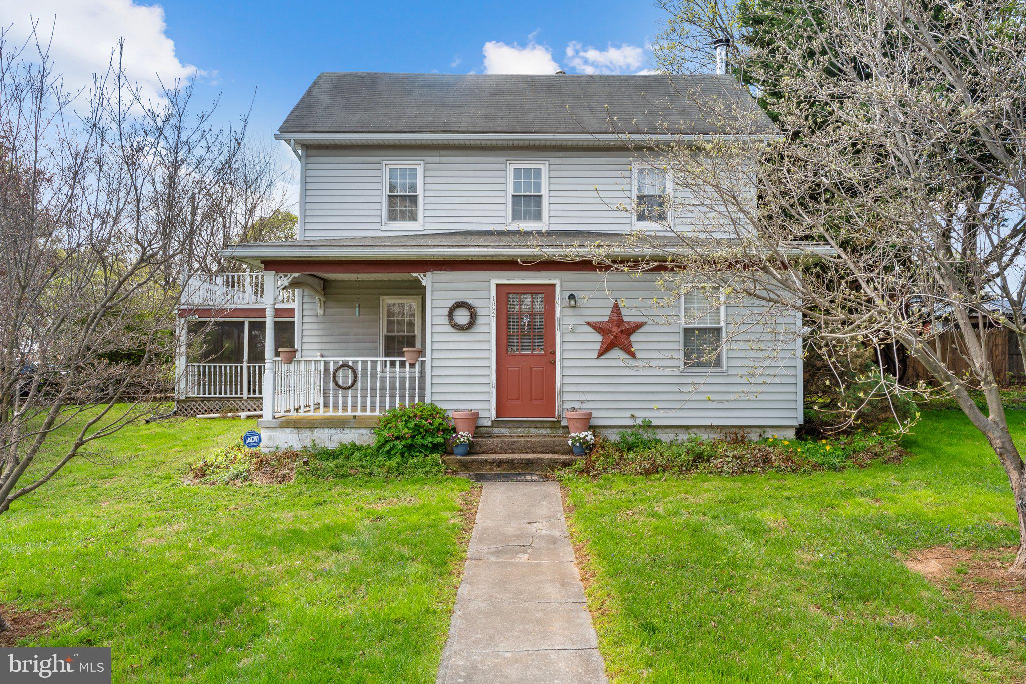 Charming home with inviting porch.