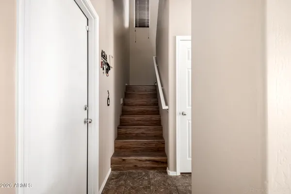 a view of entryway with stairs