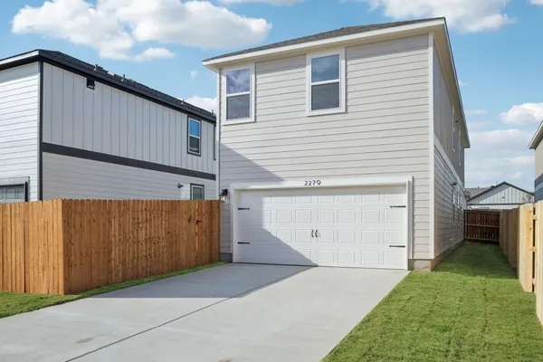 a view of backyard of garage