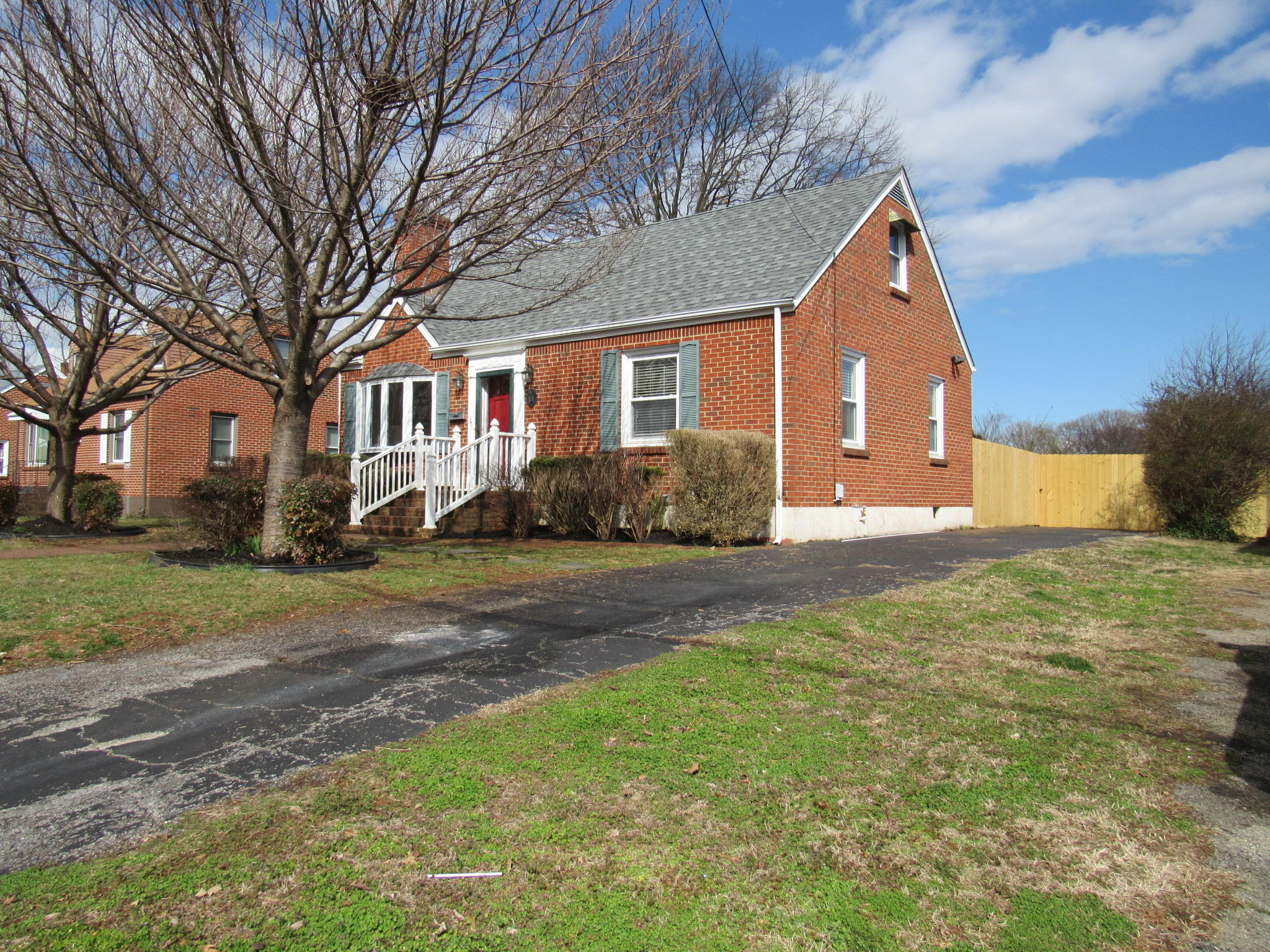 4413 Hazelridge Road Northwest Roanoke, VA 24012 - Photo 3 of 23 a front view of house with yard and trees around