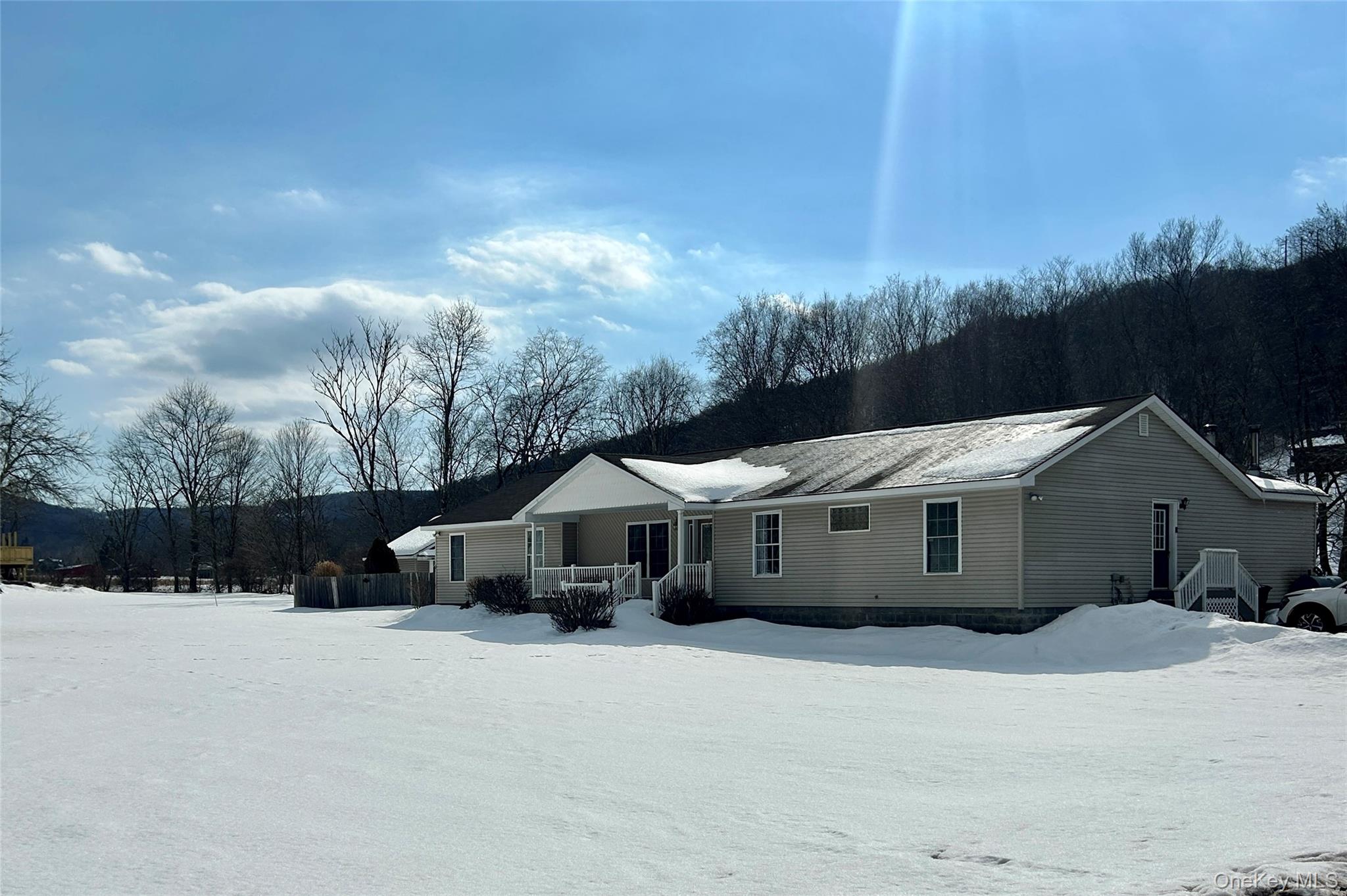 View of front of property with covered porch