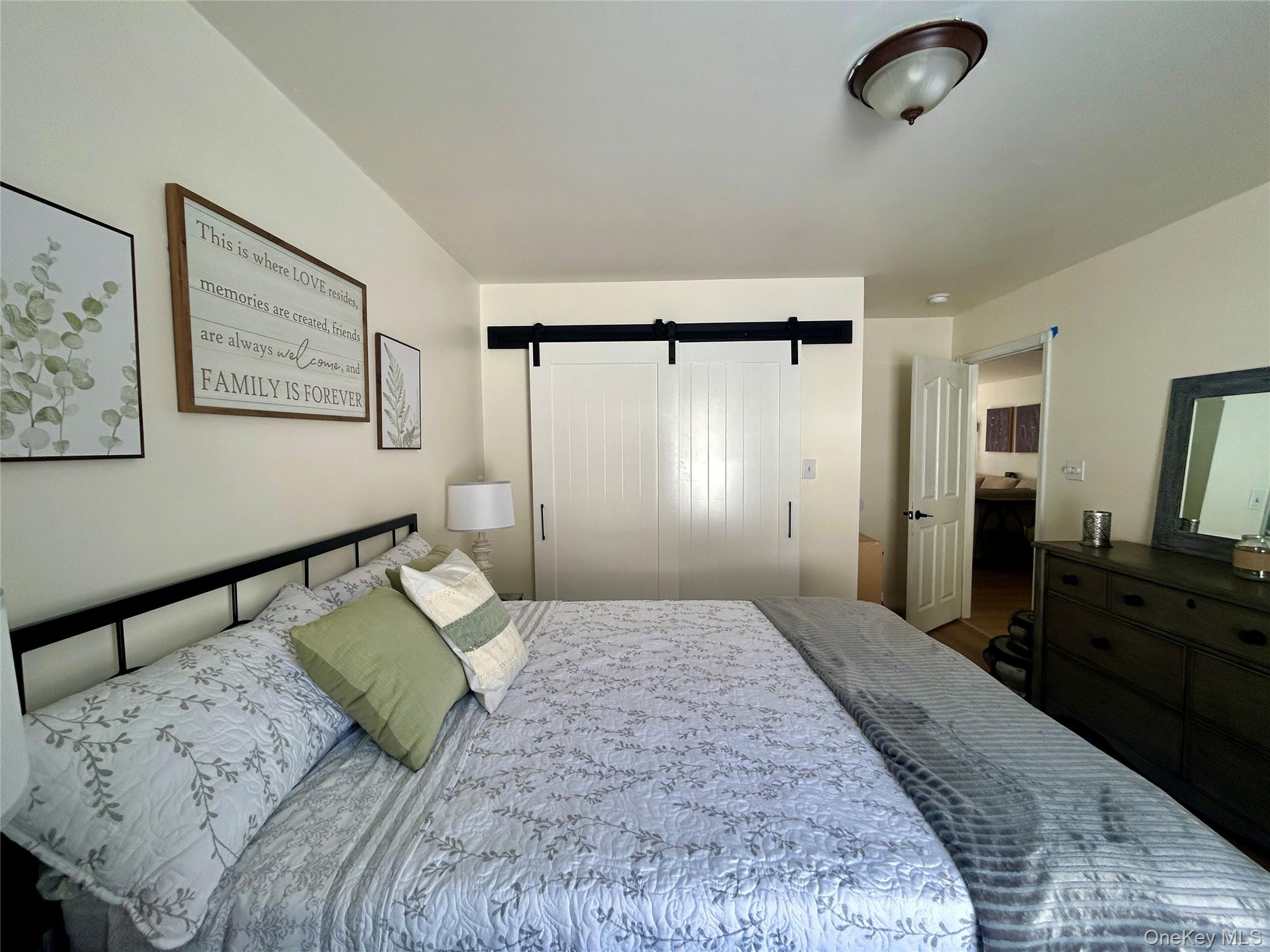 290 Gulf Road Roscoe, NY 12776 - Photo 21 of 26 Bedroom with a barn door