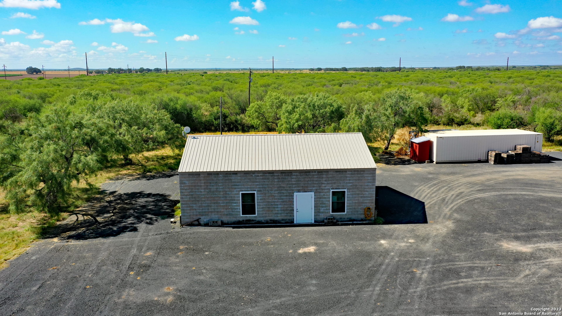 1066 Ranch Rd Highway Sabinal, TX 78881 - Photo 7 of 14 a view of a big yard with an outdoor space