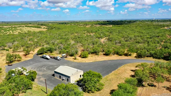 a view of a yard with an ocean