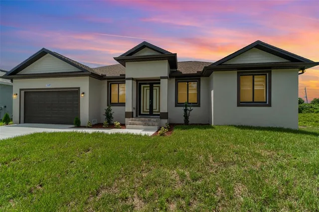 front view of a house with a yard