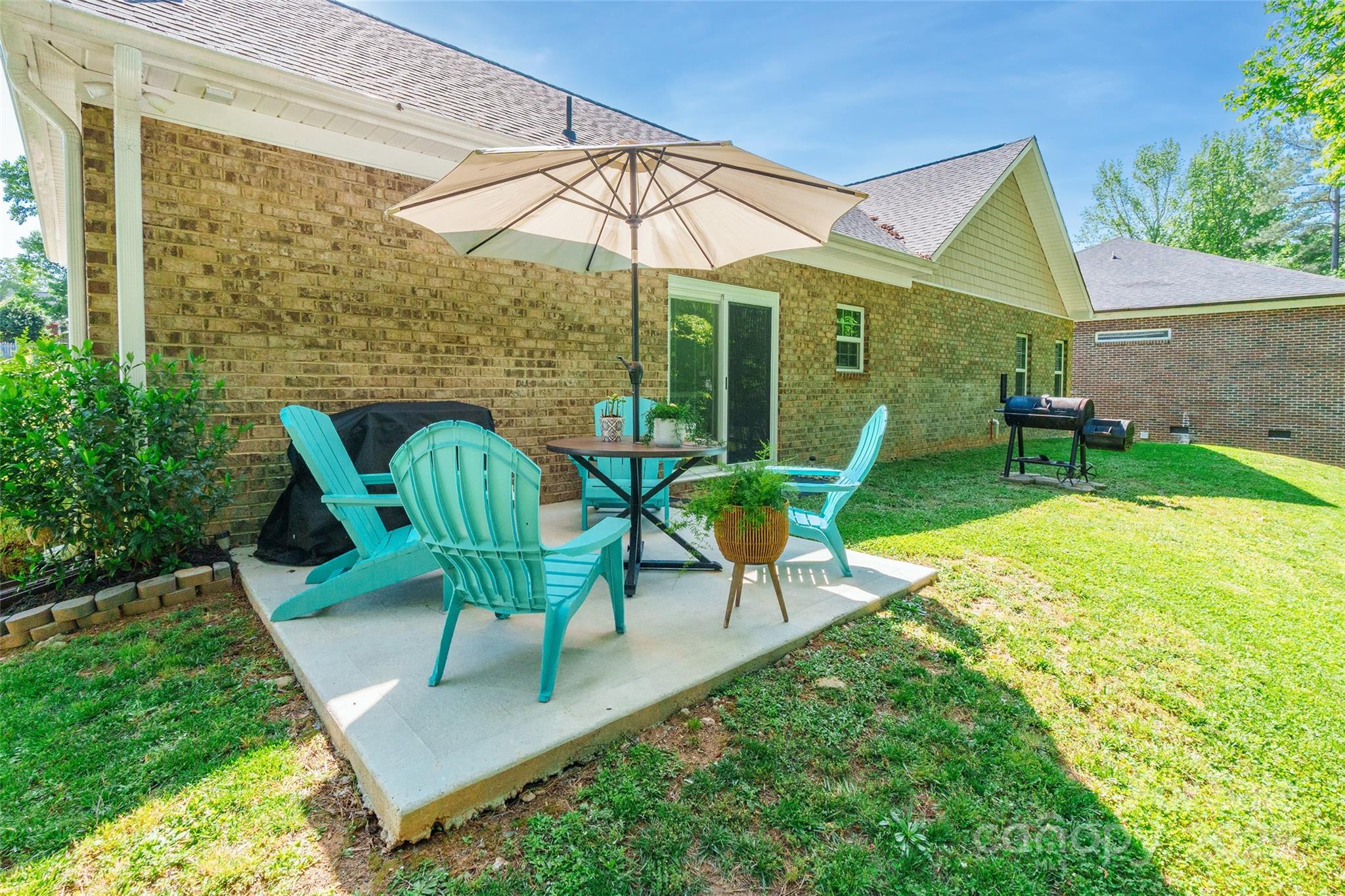 137 Ole Eastpointe Drive York, SC 29745 - Photo 25 of 28 a view of a house with backyard sitting area and garden
