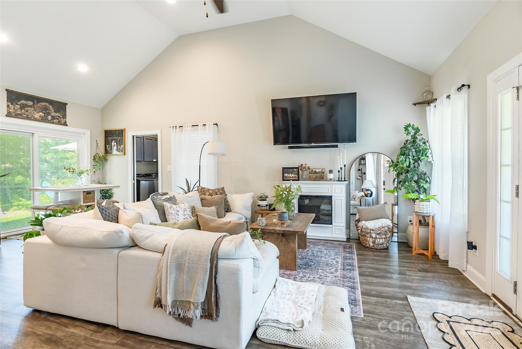 137 Ole Eastpointe Drive York, SC 29745 - Photo 6 of 28 a living room with fireplace furniture and a flat screen tv