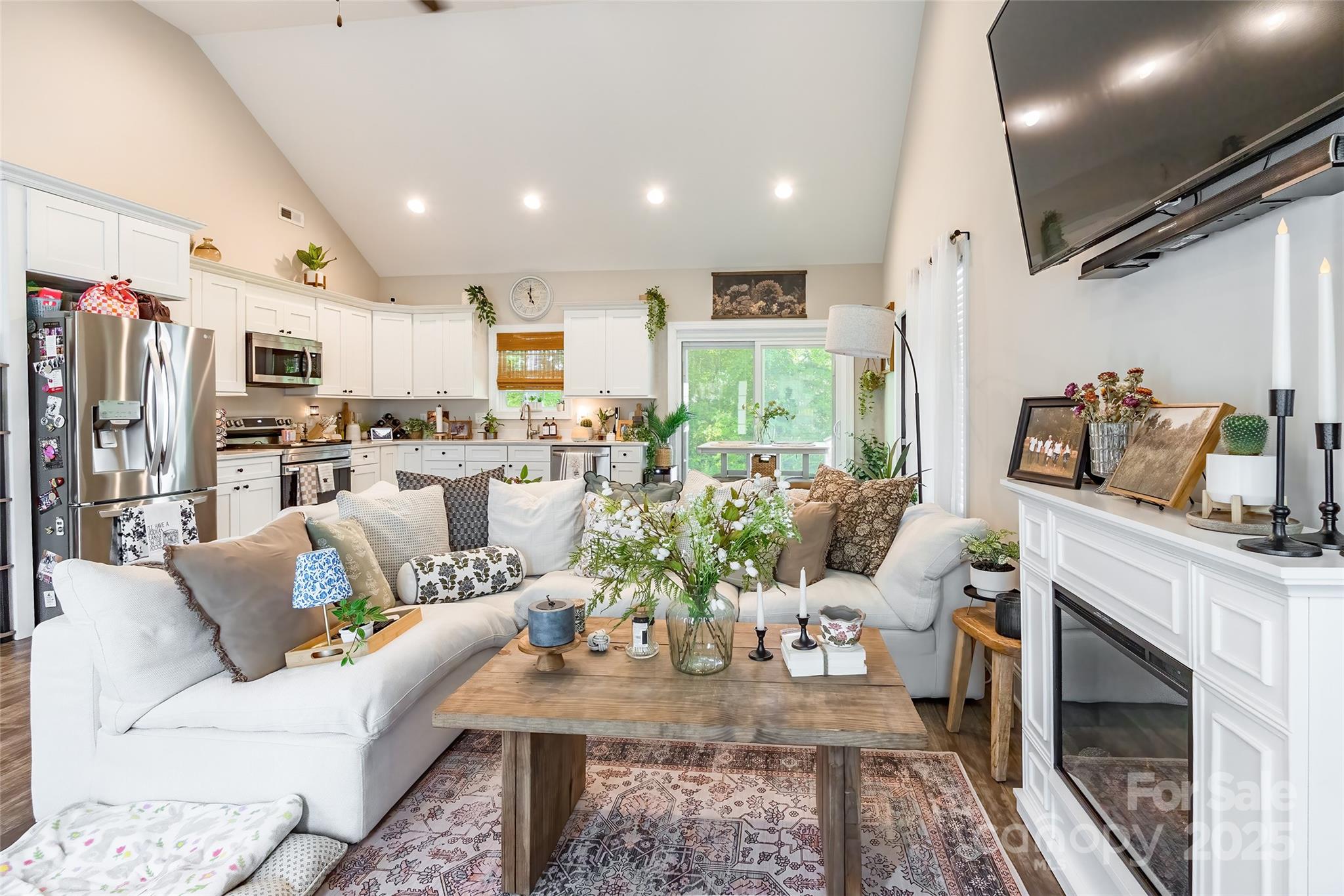 137 Ole Eastpointe Drive York, SC 29745 - Photo 7 of 28 a living room with furniture fireplace and a table