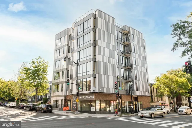 a view of a building and a street