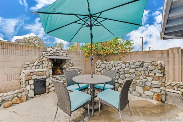 an empty room with windows and entrance