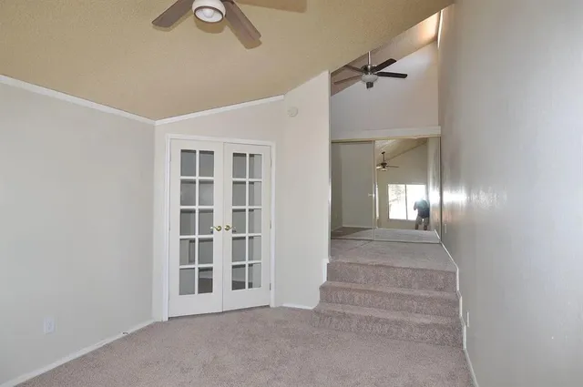 a view of an entryway with wooden floor