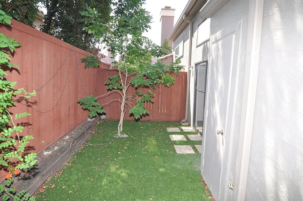 4242 North Capistrano Drive, Unit 118 Dallas, TX 75287 - Photo 14 of 25 a backyard with potted plants
