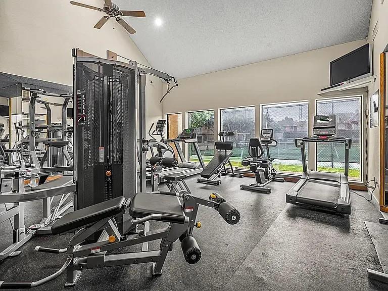 4242 North Capistrano Drive, Unit 118 Dallas, TX 75287 - Photo 23 of 25 a view of a room with gym equipment