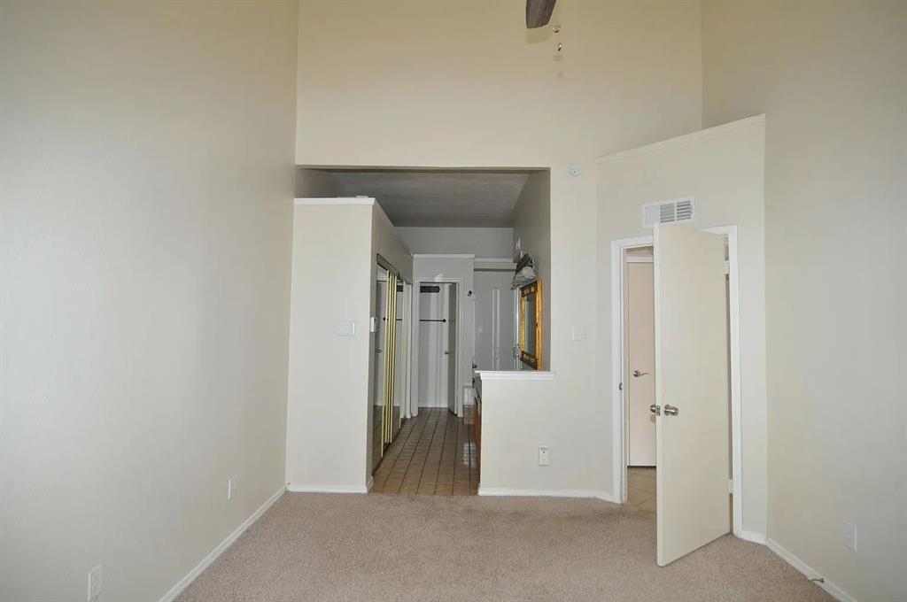 4242 North Capistrano Drive, Unit 118 Dallas, TX 75287 - Photo 9 of 25 a view of a room with a hallway